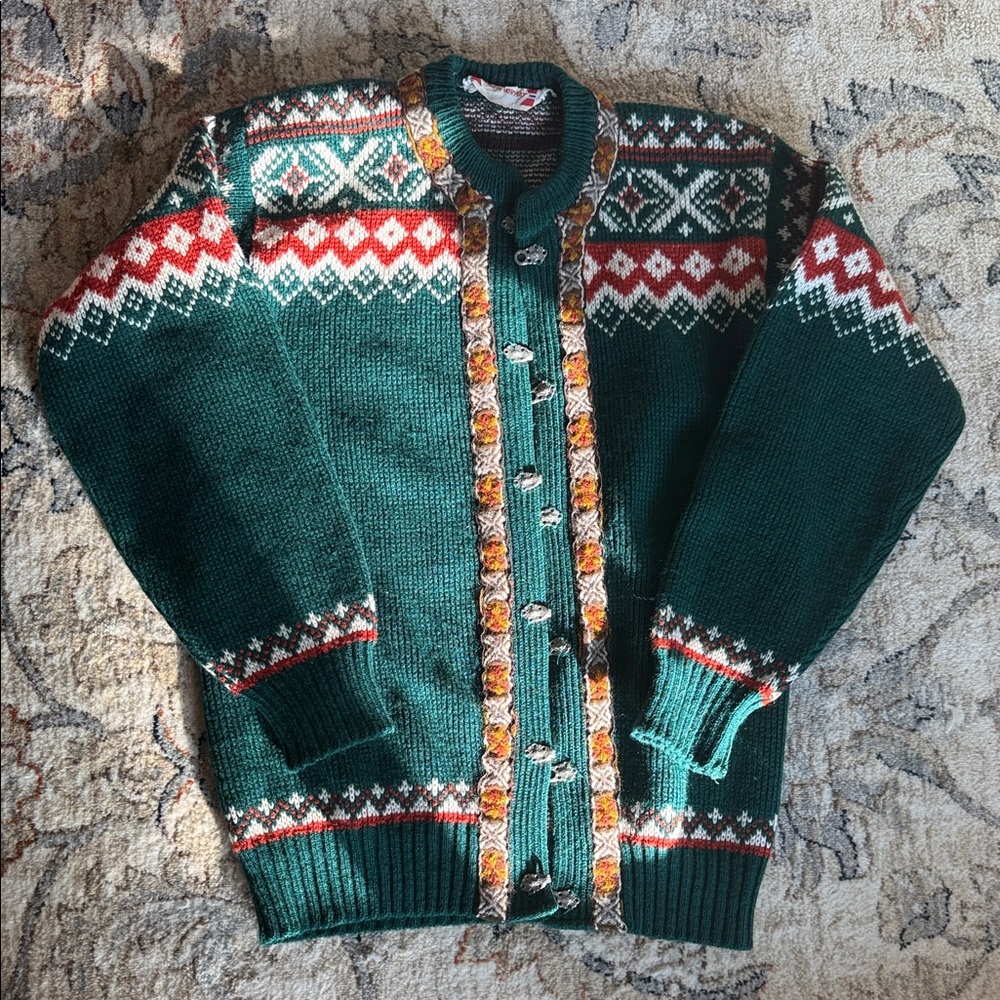 This is a vintage 90s Eddie Bauer Nordic wool blend cardigan sweater in green